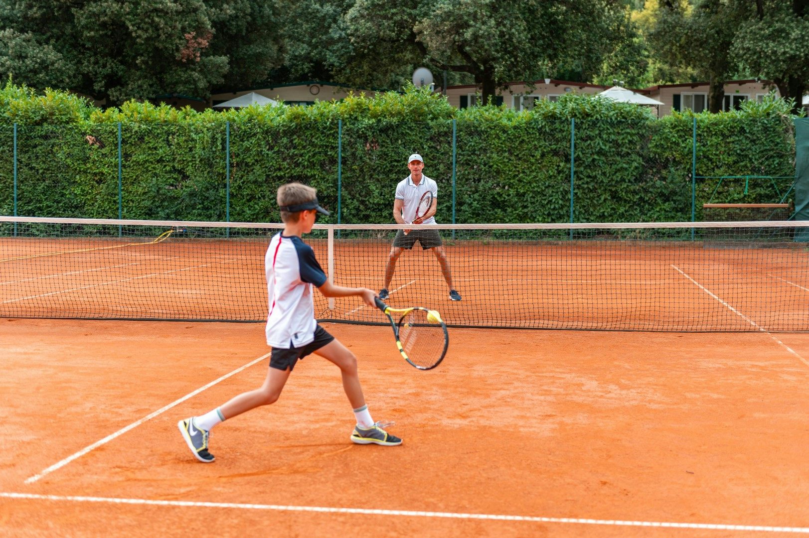 <p>Spend a rousing afternoon in a recreational game of tennis with friends. Tennis courts are available for use for a small fee in the northern area of the resort, near the entrance to the Camp.</p>